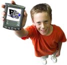 Kid holding a Palm handheld displaying the Planet 5th logo